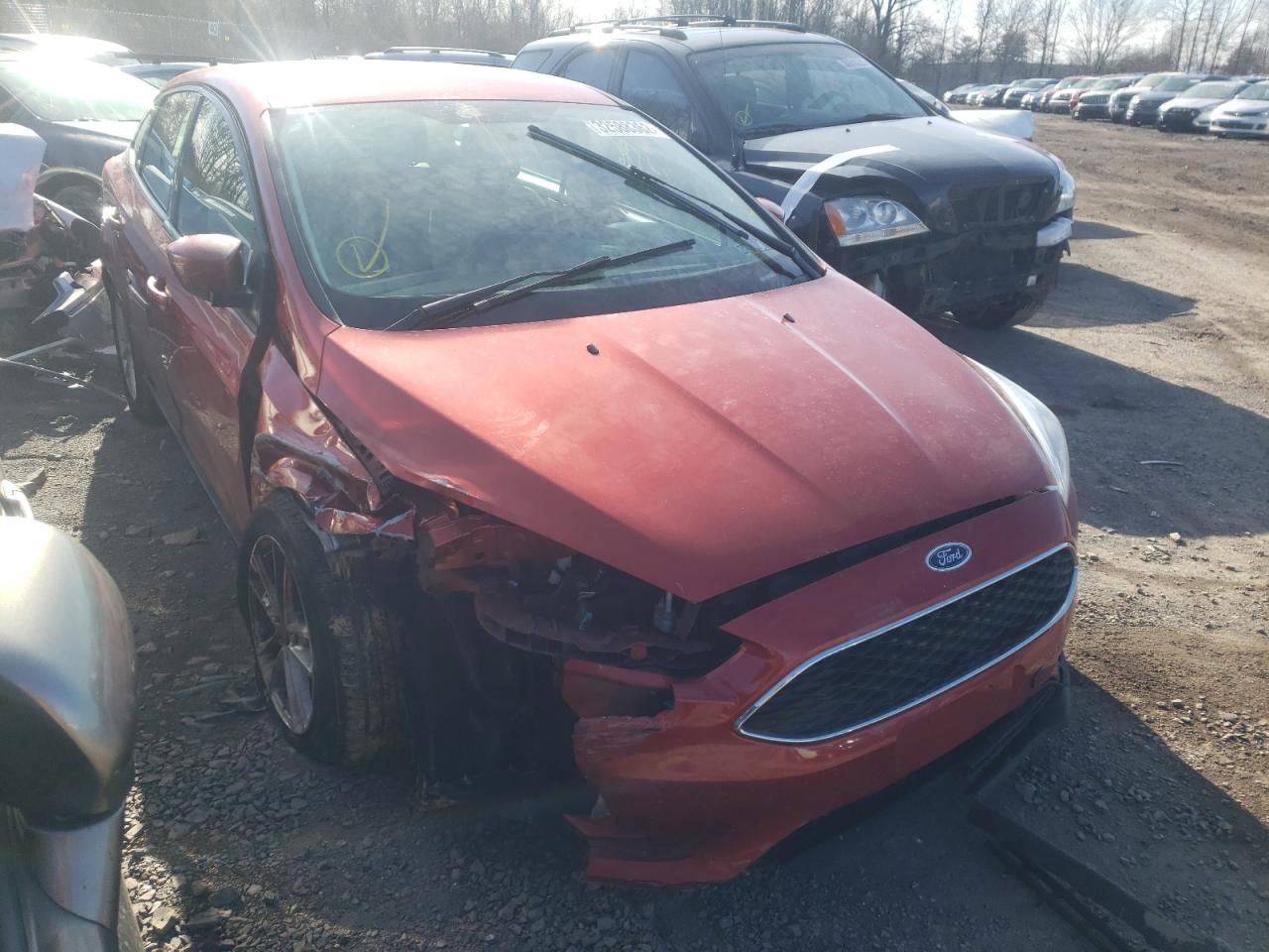 FORD FOCUS SE 2018 with VIN 1FADP3F24JL326820 - Photo from auction