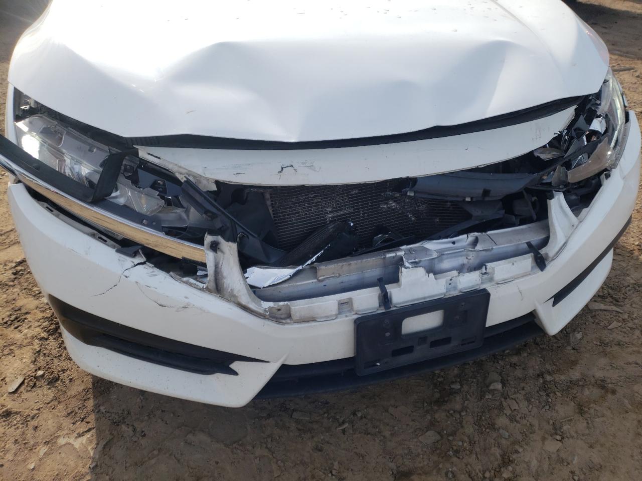 Photo 9 from auction – 2017 HONDA CIVIC LX with VIN 2HGFC2F54HH517214