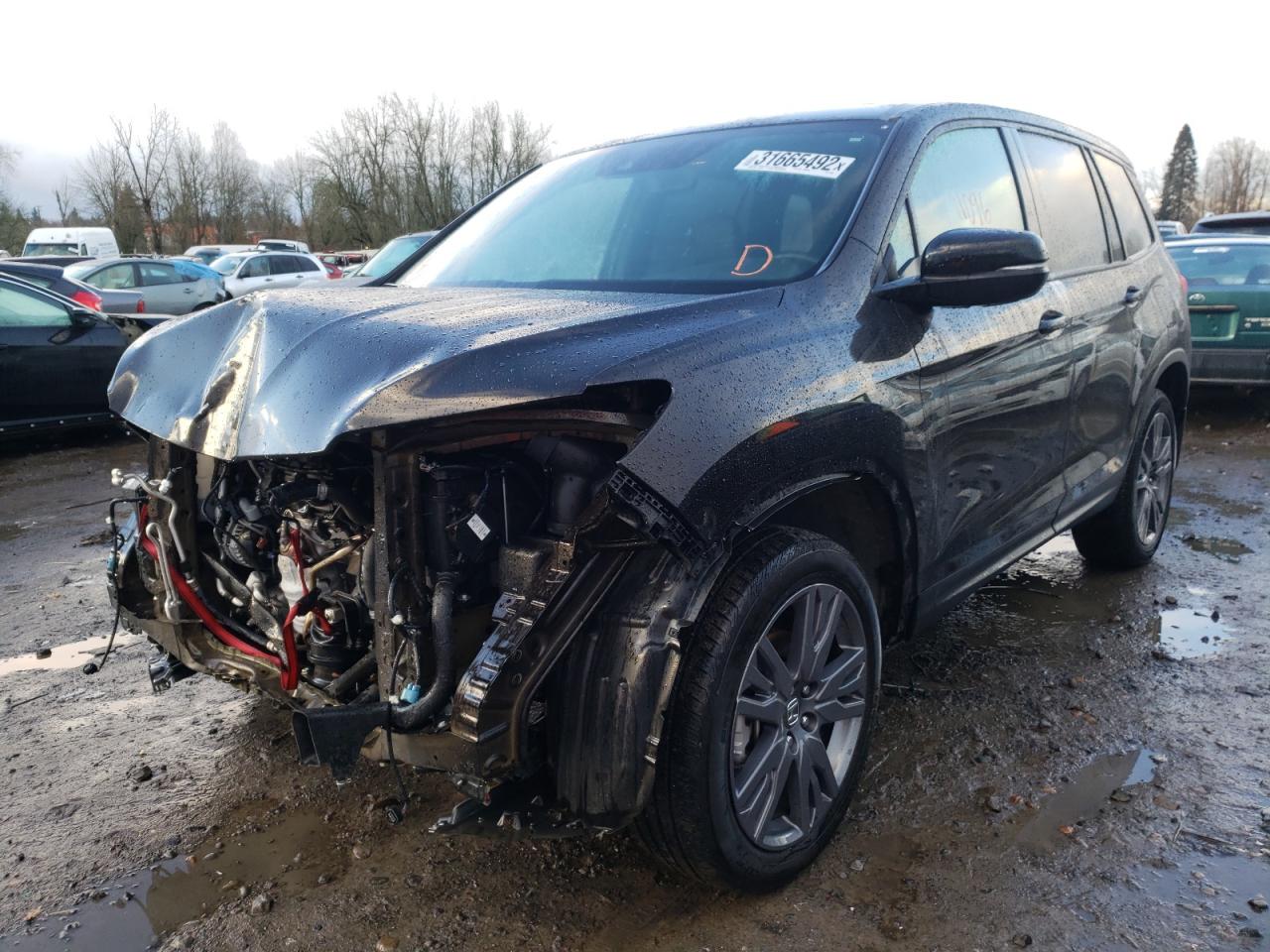 Photo 2 from auction – 2020 HONDA PASSPORT E with VIN 5FNYF8H57LB006237