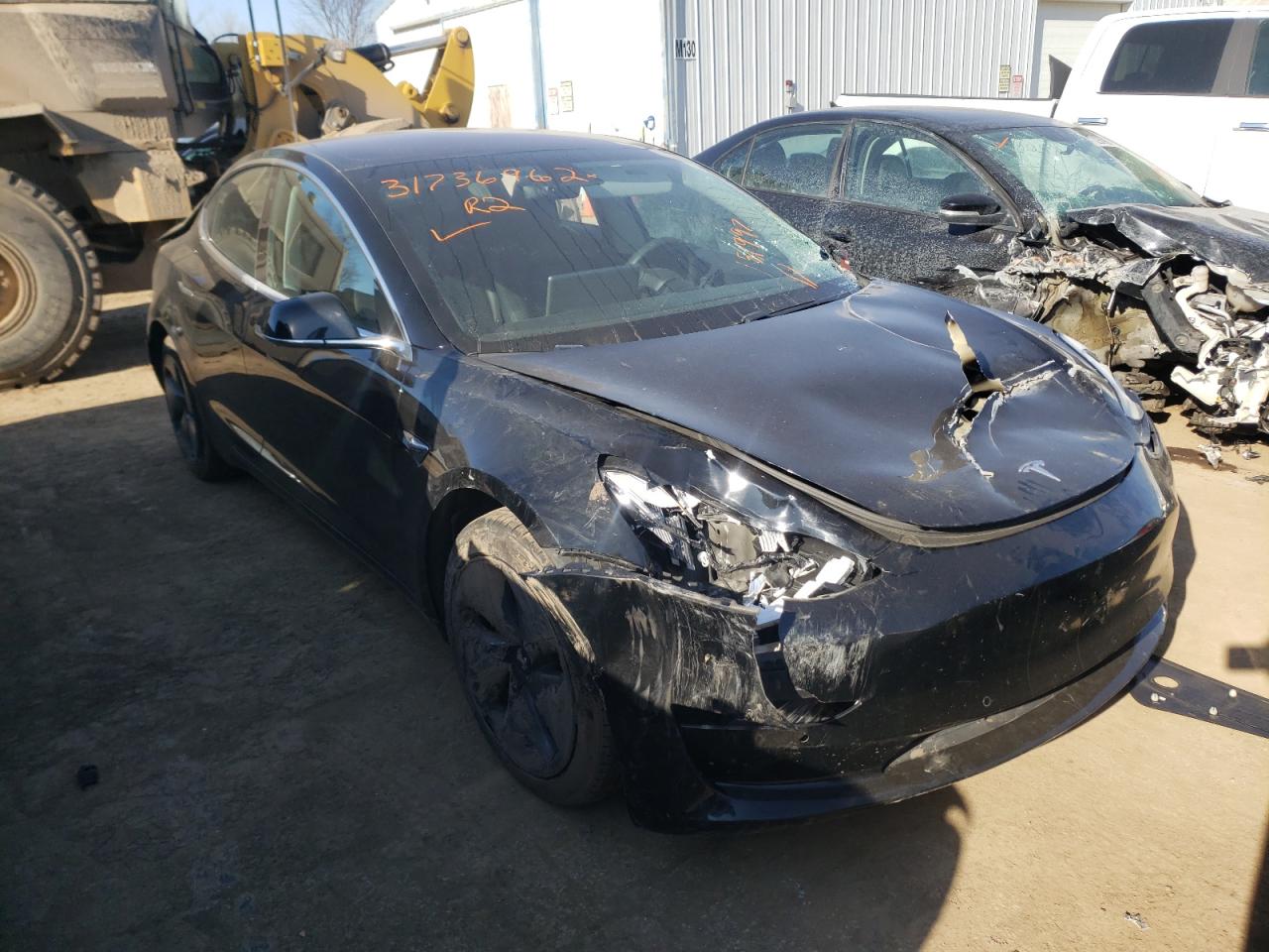 TESLA MODEL 3 2018 with VIN 5YJ3E1EA6JF151997 - Photo from auction