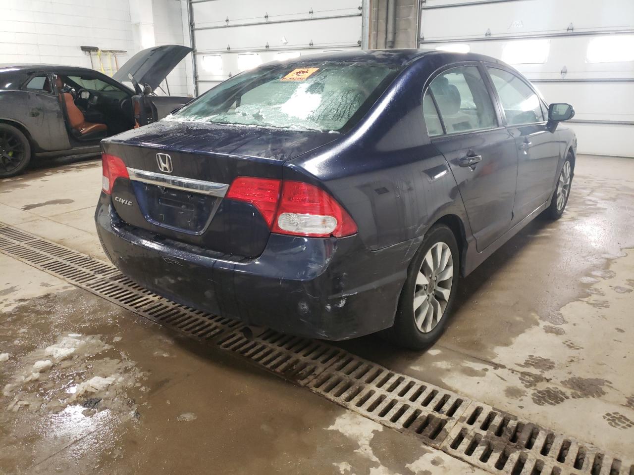 Photo 4 from auction – 2010 HONDA CIVIC EX with VIN 19XFA1F88AE035999