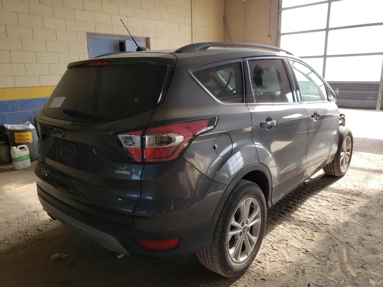Photo 4 from auction – 2017 FORD ESCAPE SE with VIN 1FMCU0GD1HUC08267
