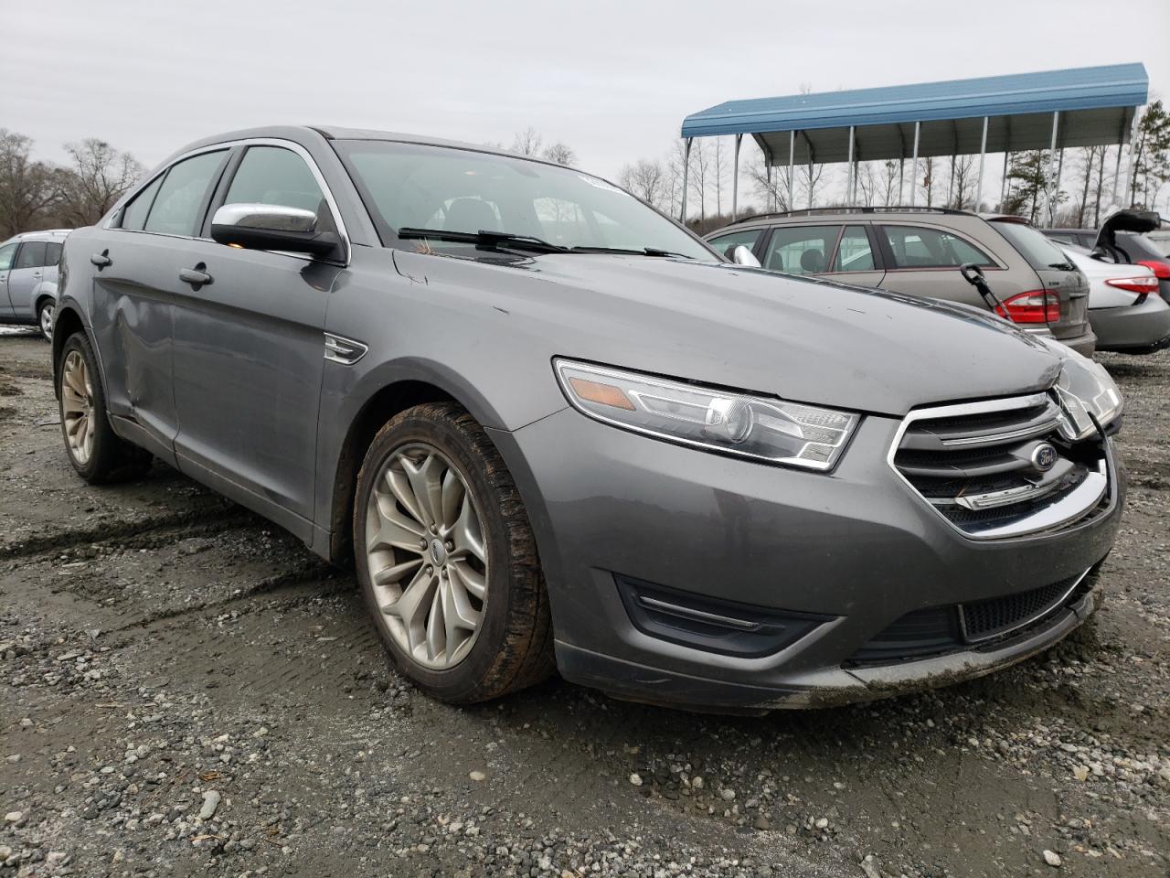FORD TAURUS LIM 2014 with VIN 1FAHP2F89EG134761 - Photo from auction