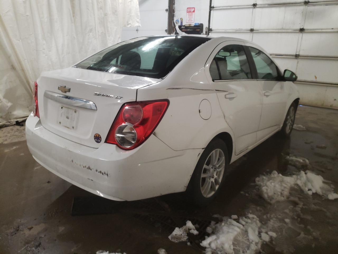 Photo 4 from auction – 2012 CHEVROLET SONIC LT with VIN 1G1JC5SH7C4145036