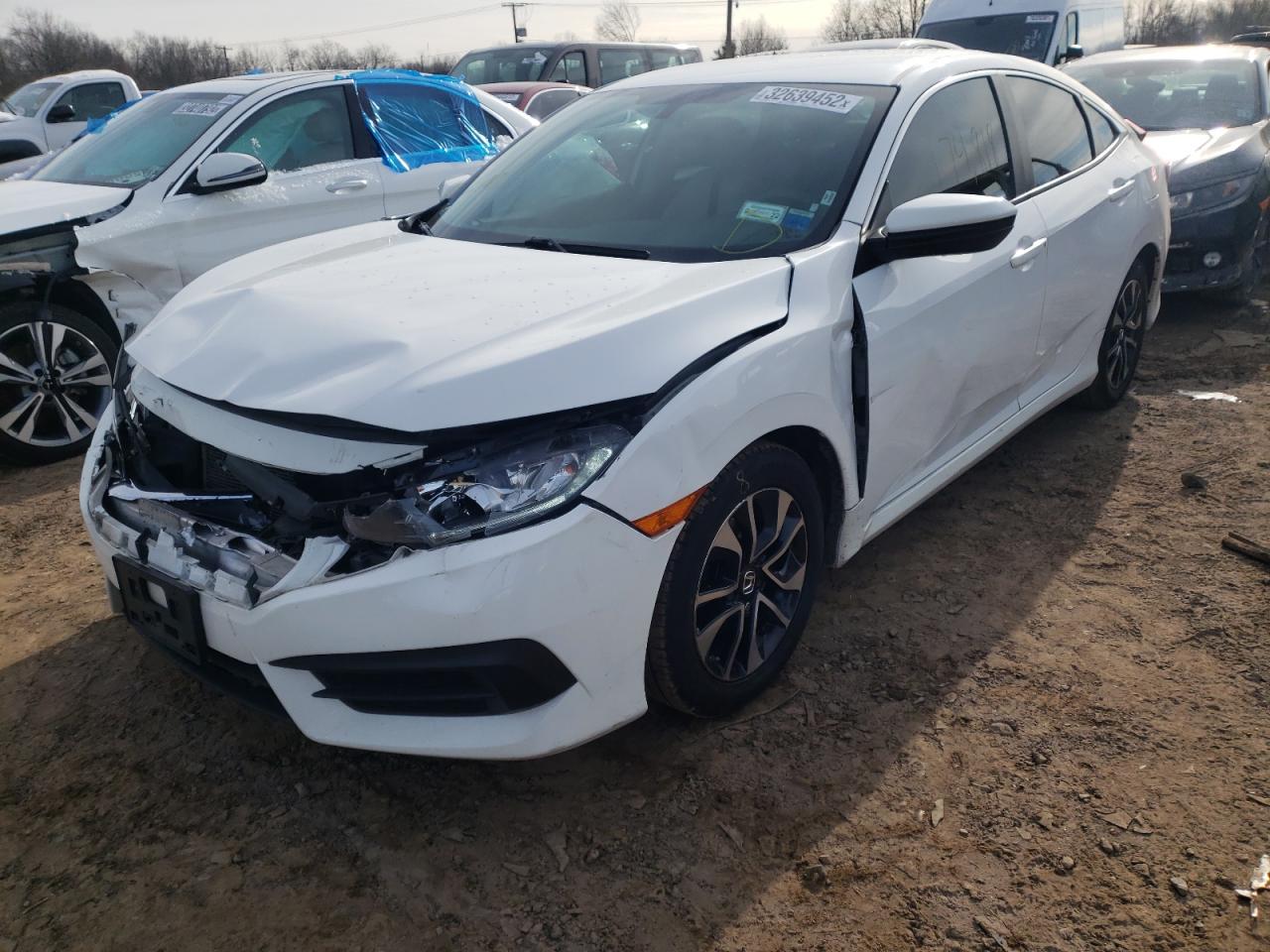 Photo 2 from auction – 2017 HONDA CIVIC LX with VIN 2HGFC2F54HH517214