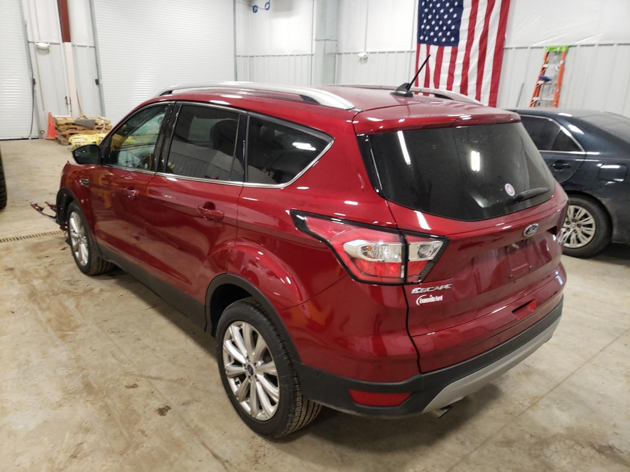 Photo 3 from auction – 2018 FORD ESCAPE TIT with VIN 1FMCU9J98JUB06432