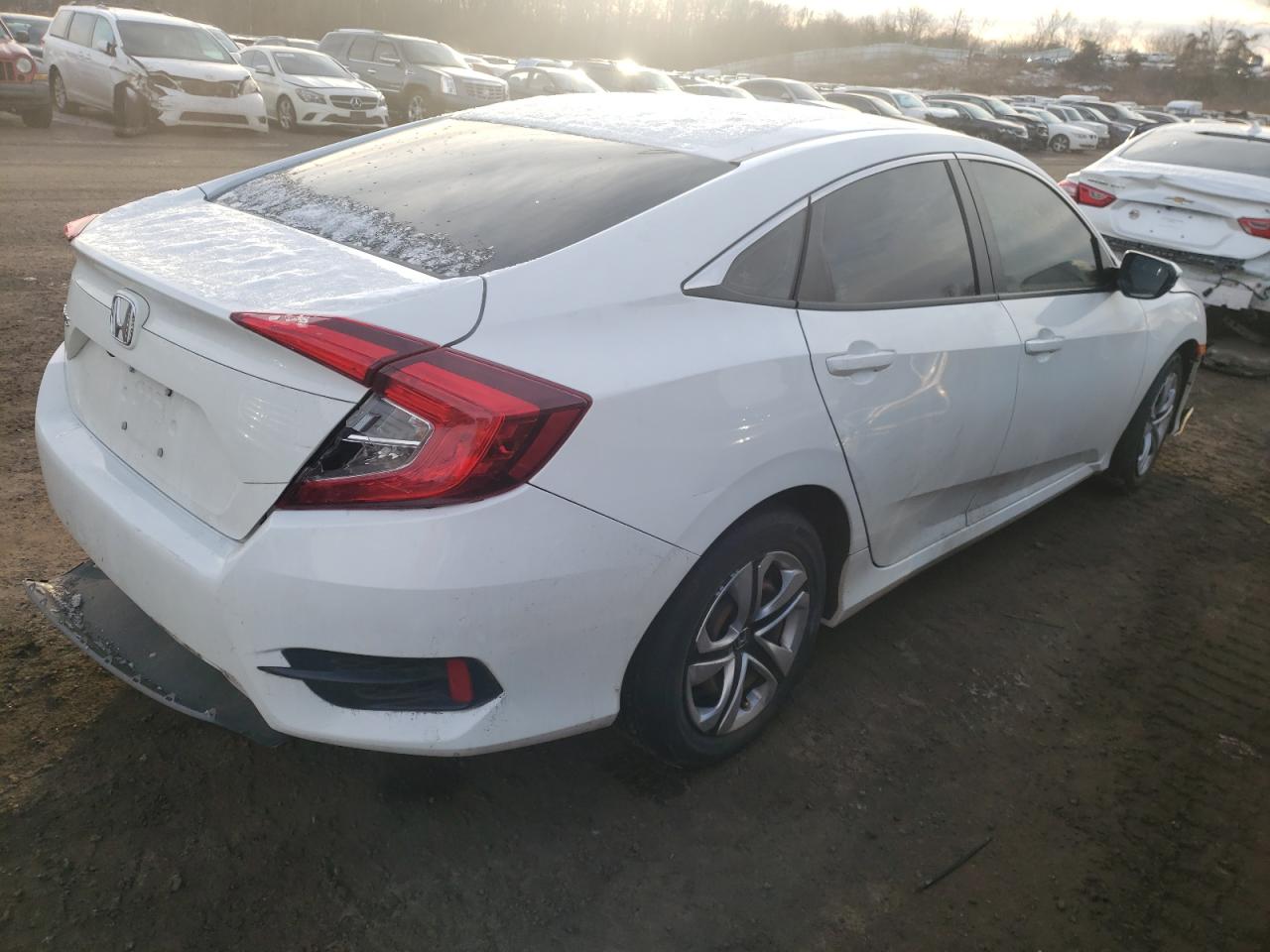 Photo 4 from auction – 2017 HONDA CIVIC LX with VIN 2HGFC2F55HH548021