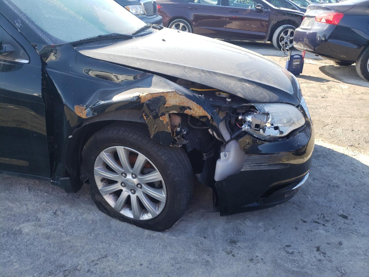 Photo 9 from auction – 2011 CHRYSLER 200 TOURIN with VIN 1C3BC1FBXBN593049