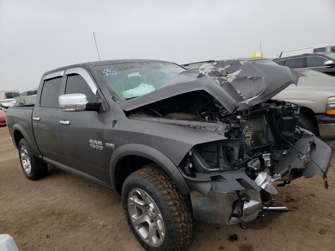 RAM 1500 LARAM 2015 with VIN 1C6RR7NT4FS699744 - Photo from auction