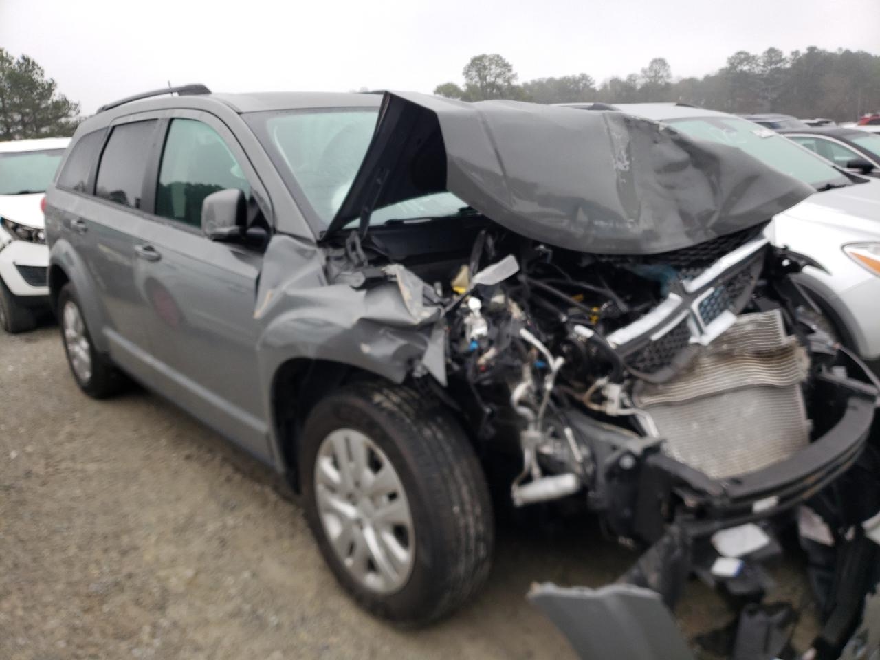 DODGE JOURNEY SE 2019 with VIN 3C4PDCBB4KT857365 - Photo from auction