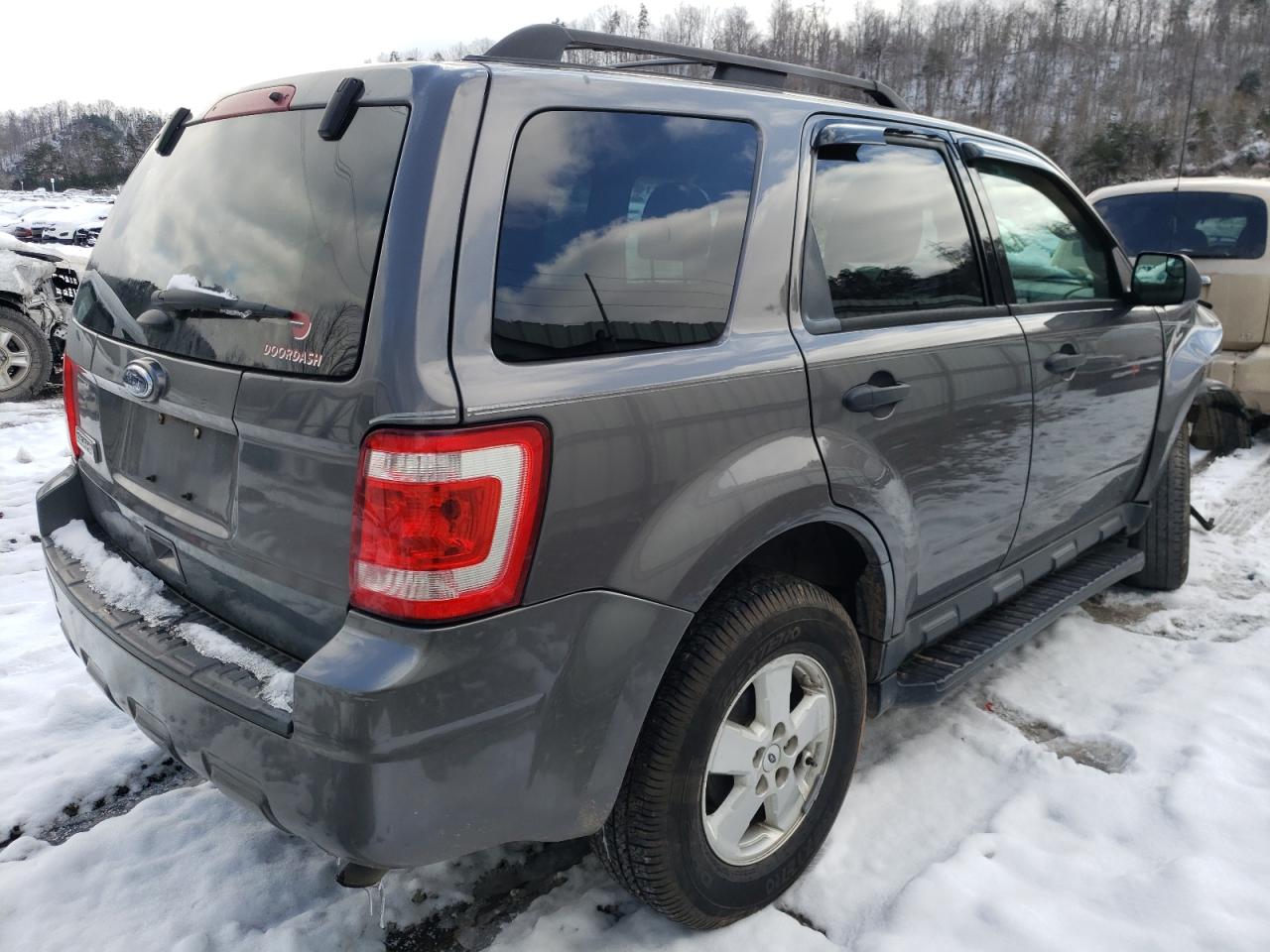 Photo 4 from auction – 2011 FORD ESCAPE XLT with VIN 1FMCU0D73BKC40588