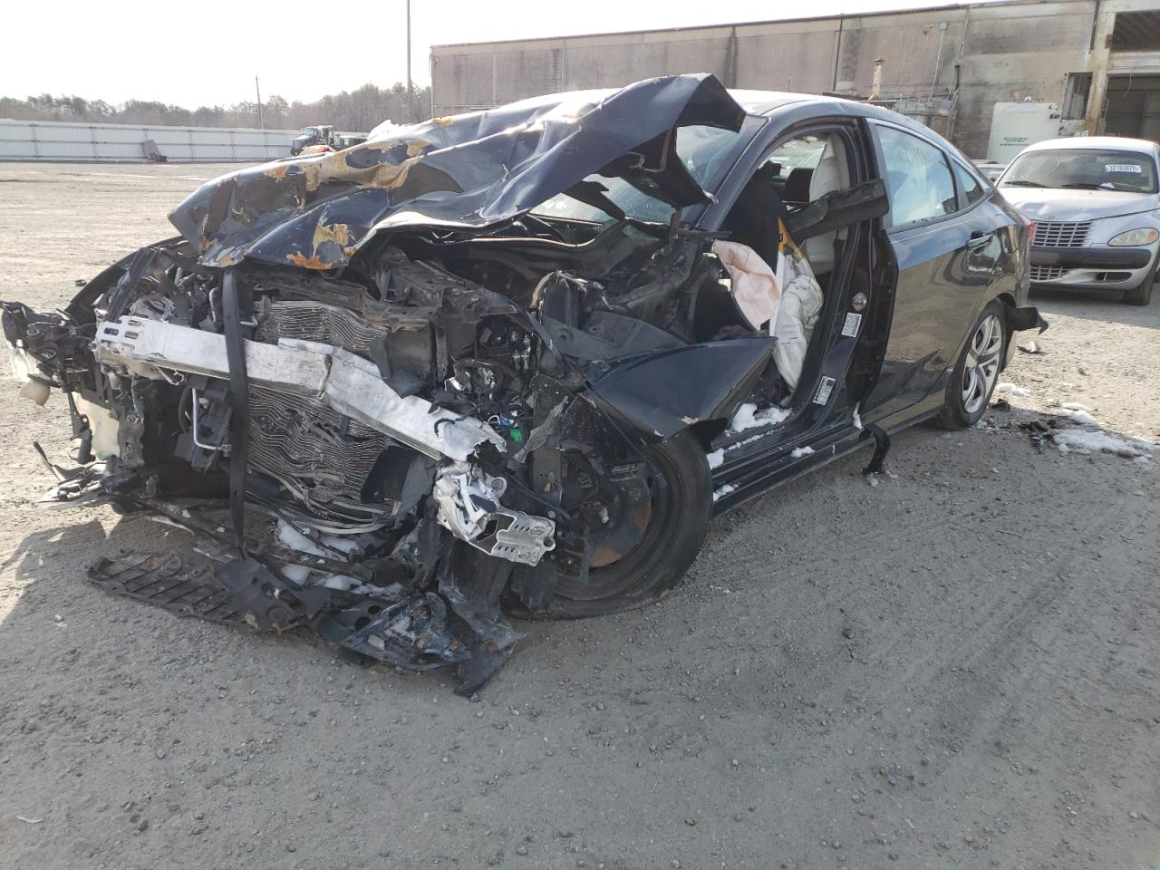 Photo 2 from auction – 2016 HONDA CIVIC LX with VIN 19XFC2F57GE038231