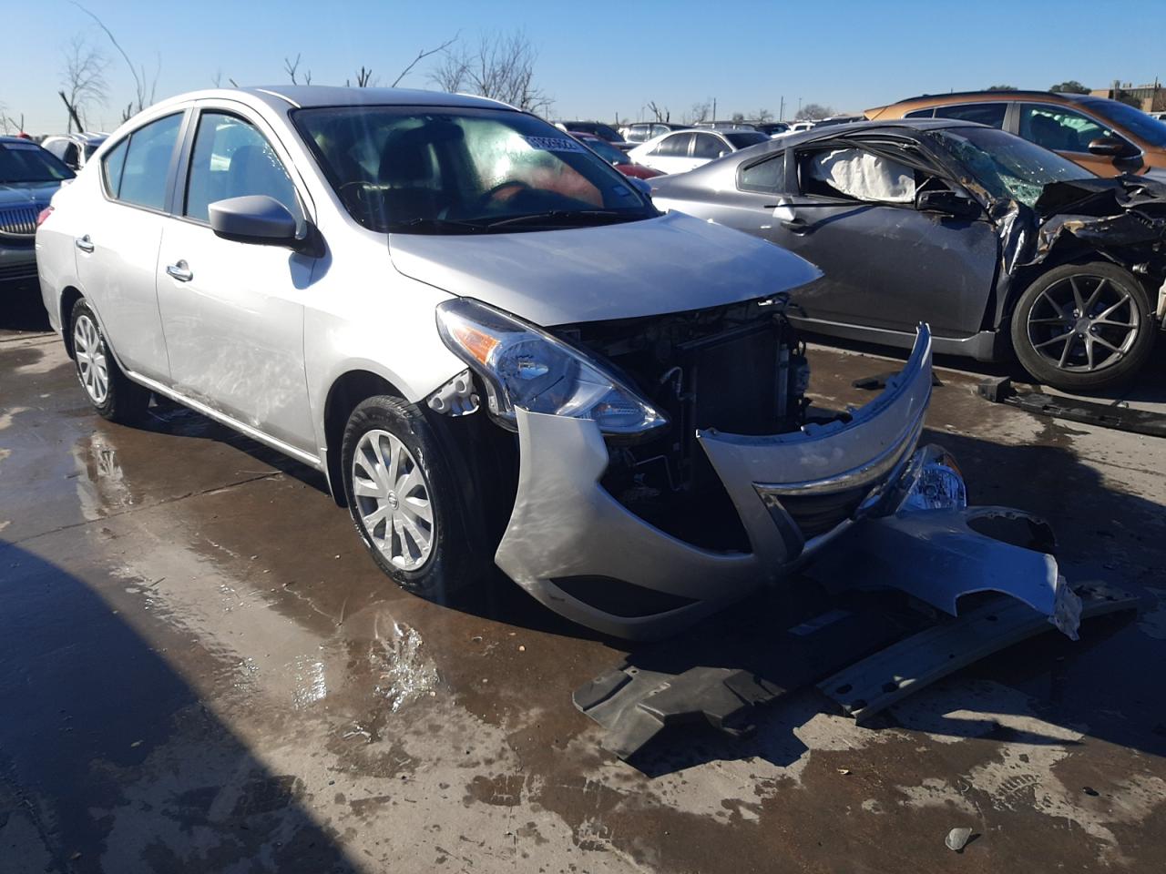 NISSAN VERSA S 2015 with VIN 3N1CN7AP4FL833804 - Photo from auction
