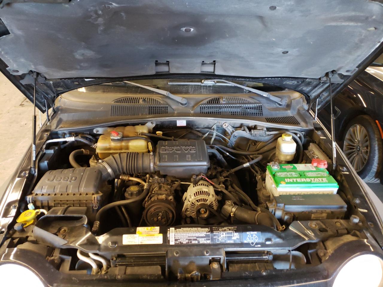 Photo 7 from auction – 2003 JEEP LIBERTY SP with VIN 1J4GL48K03W708117