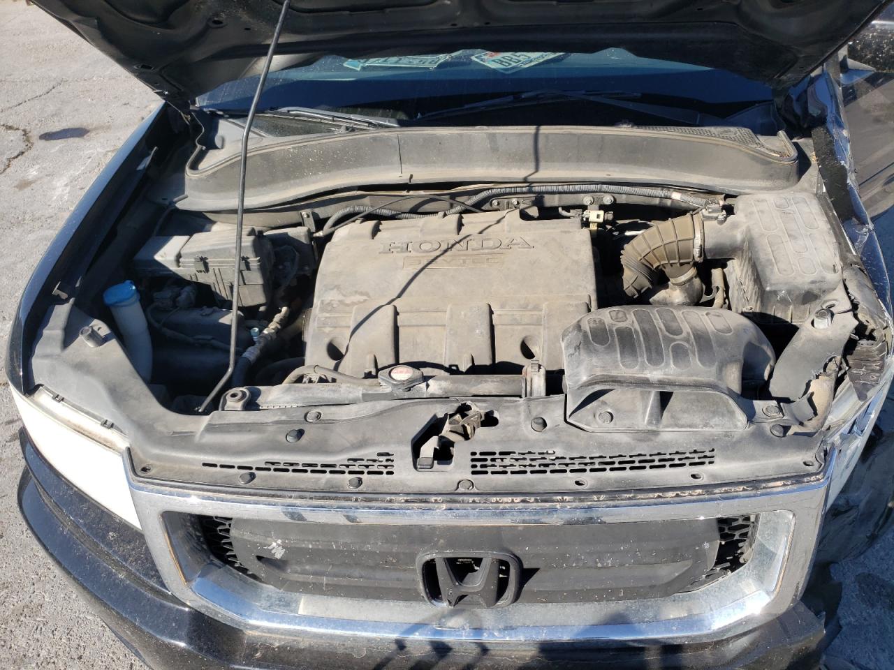 Photo 7 from auction – 2011 HONDA RIDGELINE with VIN 5FPYK1F58BB452781