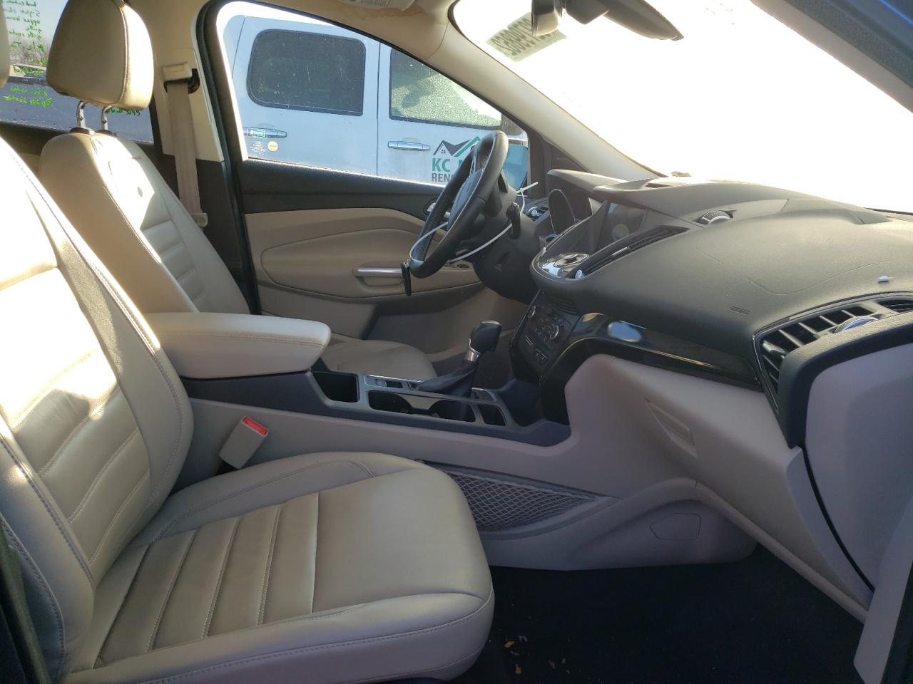 Photo 5 from auction – 2017 FORD ESCAPE TIT with VIN 1FMCU0J94HUB58467