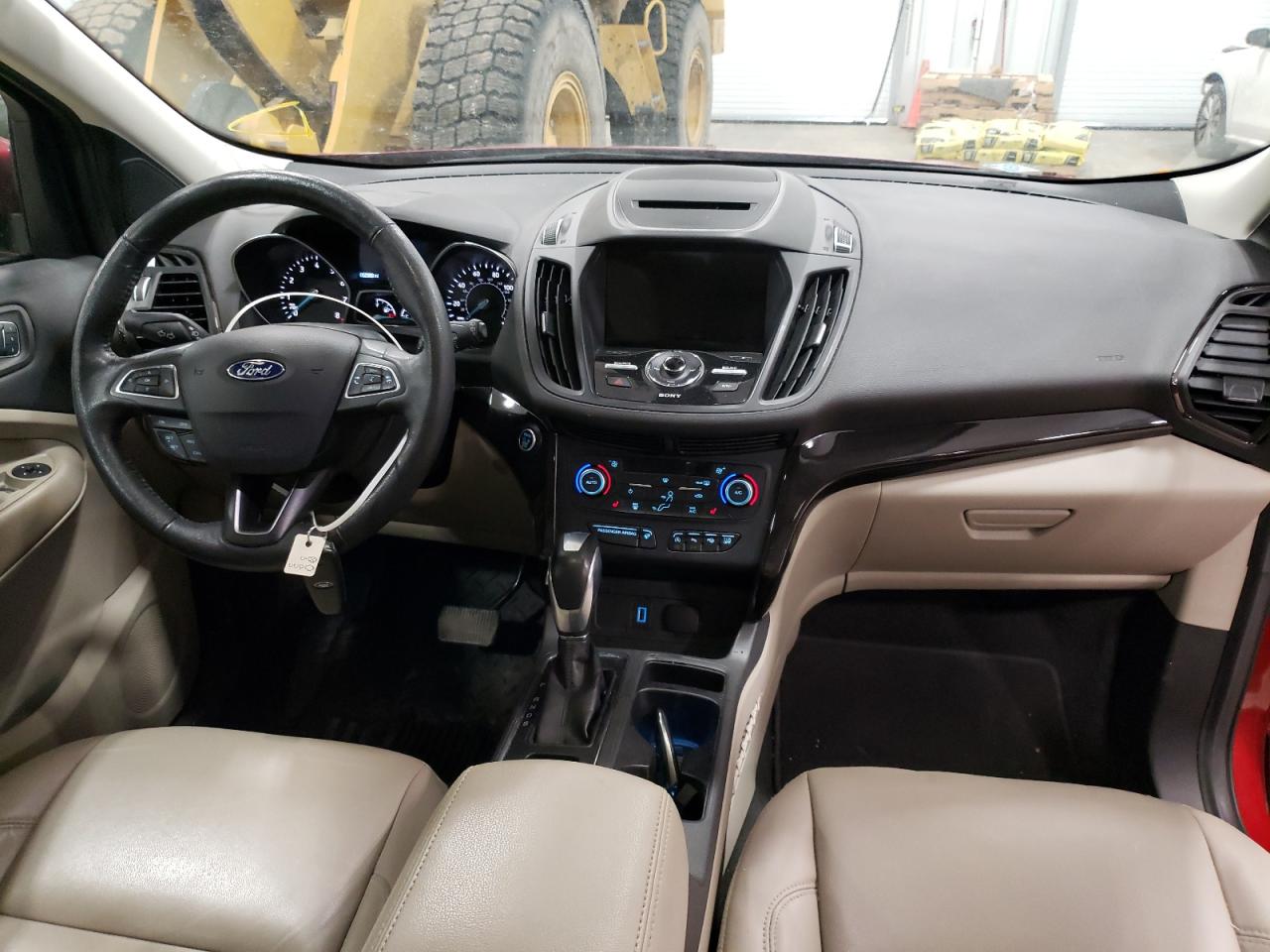 Photo 9 from auction – 2018 FORD ESCAPE TIT with VIN 1FMCU9J98JUB06432
