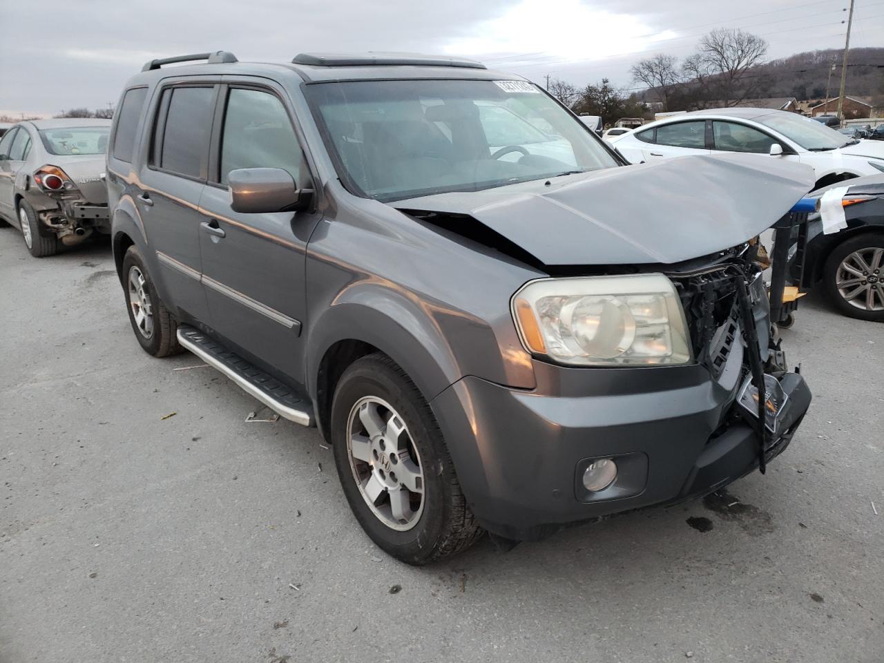 HONDA PILOT TOUR 2010 with VIN 5FNYF4H90AB019498 - Photo from auction
