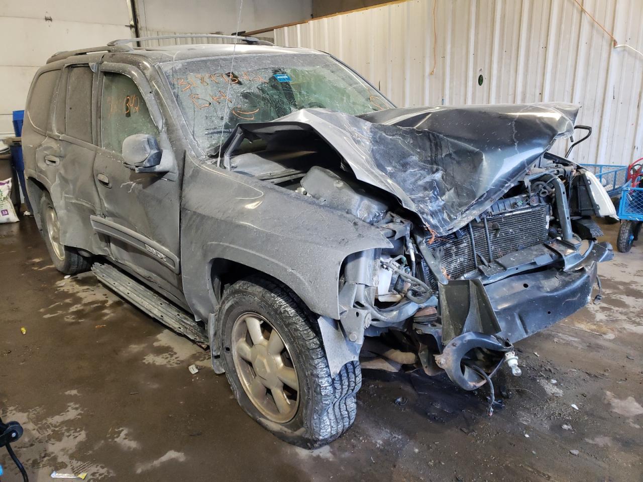 GMC ENVOY 2003 with VIN 1GKDT13S732210927 - Photo from auction