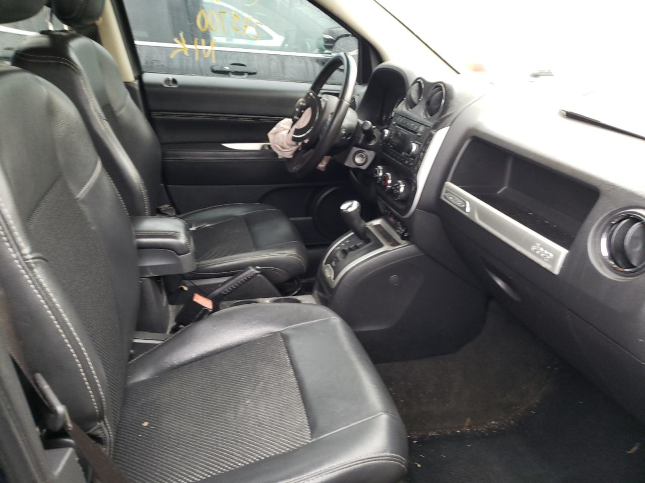 Photo 5 from auction – 2014 JEEP COMPASS LA with VIN 1C4NJCEAXED642926