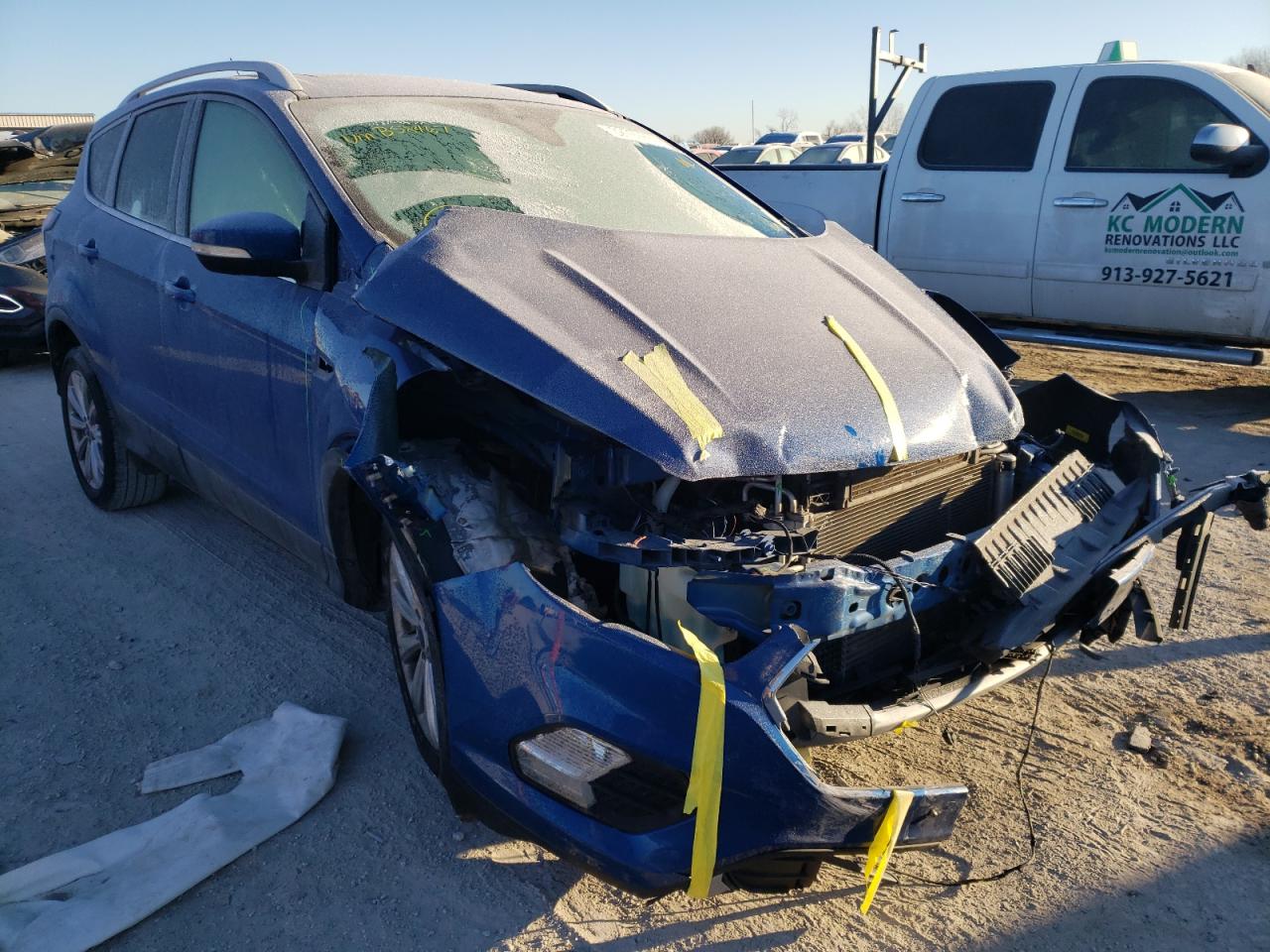FORD ESCAPE TIT 2017 with VIN 1FMCU0J94HUB58467 - Photo from auction