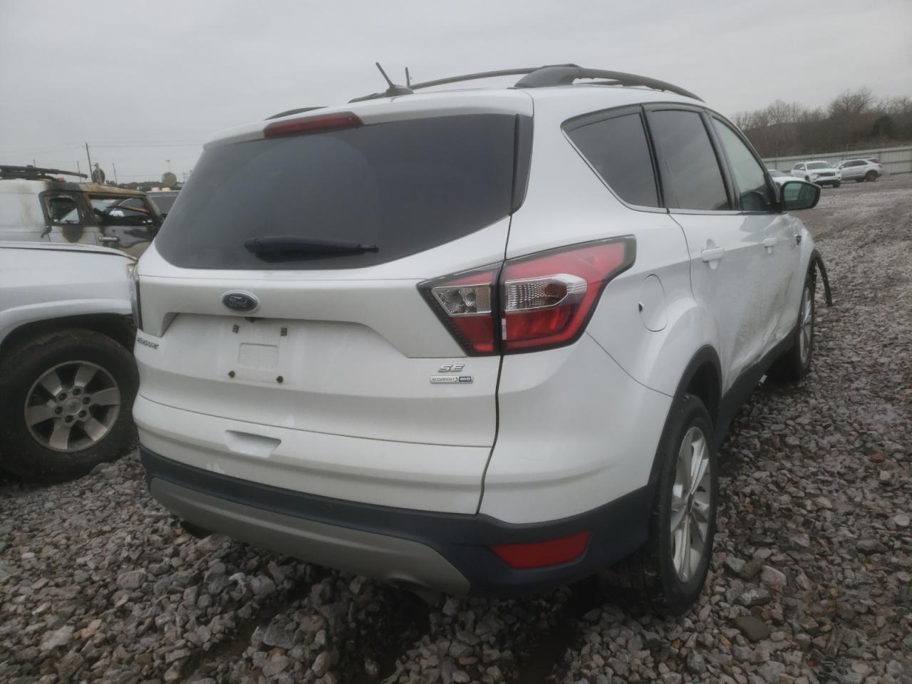 Photo 4 from auction – 2017 FORD ESCAPE SE with VIN 1FMCU9GD6HUA69242