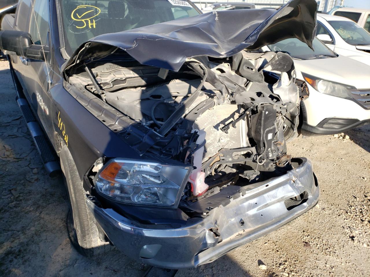 Photo 9 from auction – 2014 RAM 1500 SLT with VIN 1C6RR6LT4ES326800