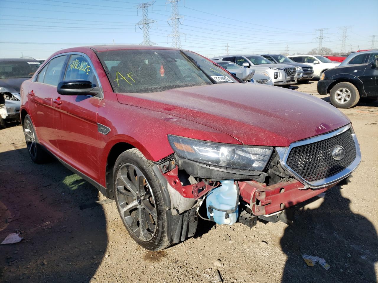 FORD TAURUS SHO 2014 with VIN 1FAHP2KT8EG131098 - Photo from auction