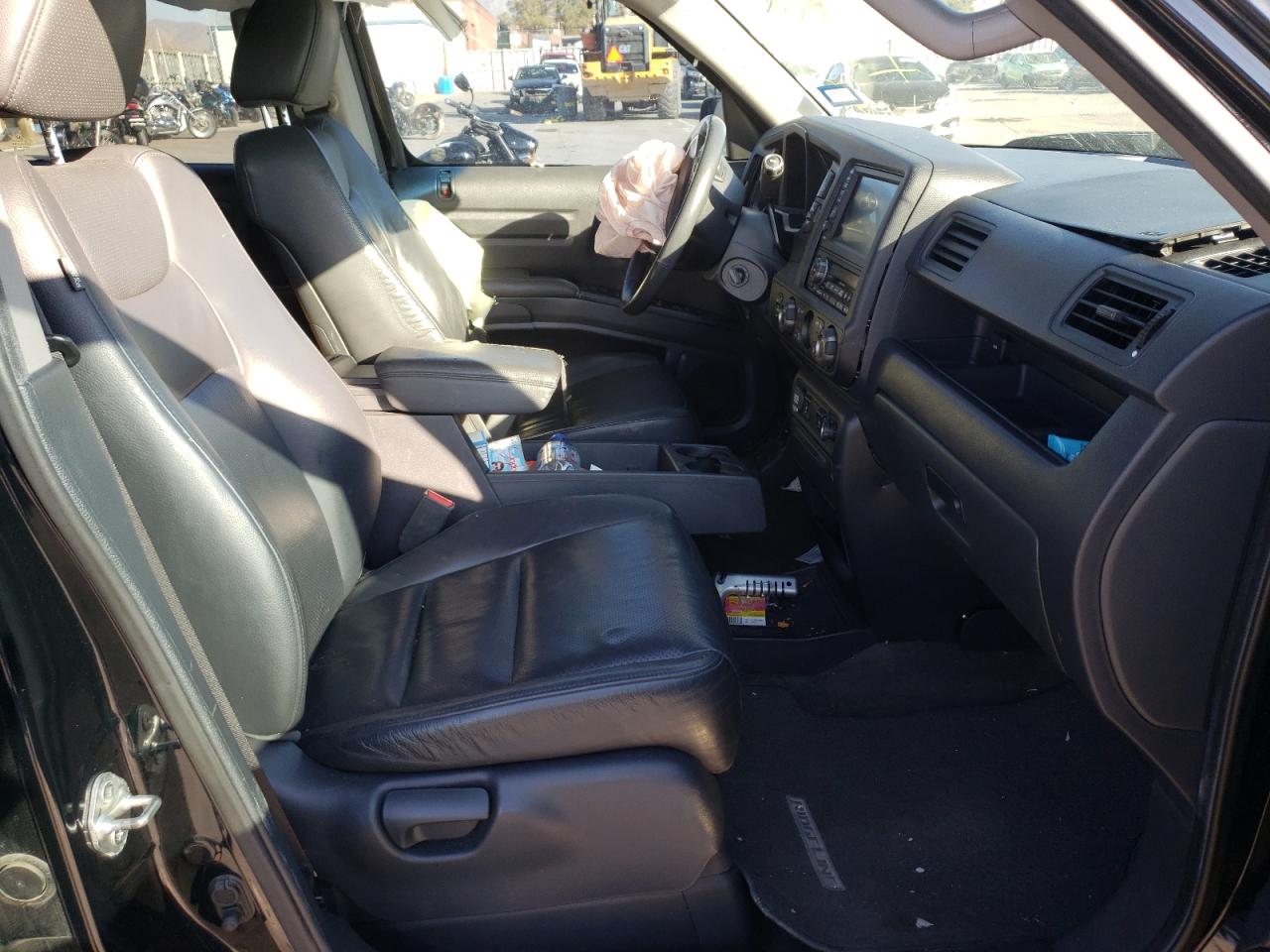 Photo 5 from auction – 2011 HONDA RIDGELINE with VIN 5FPYK1F58BB452781