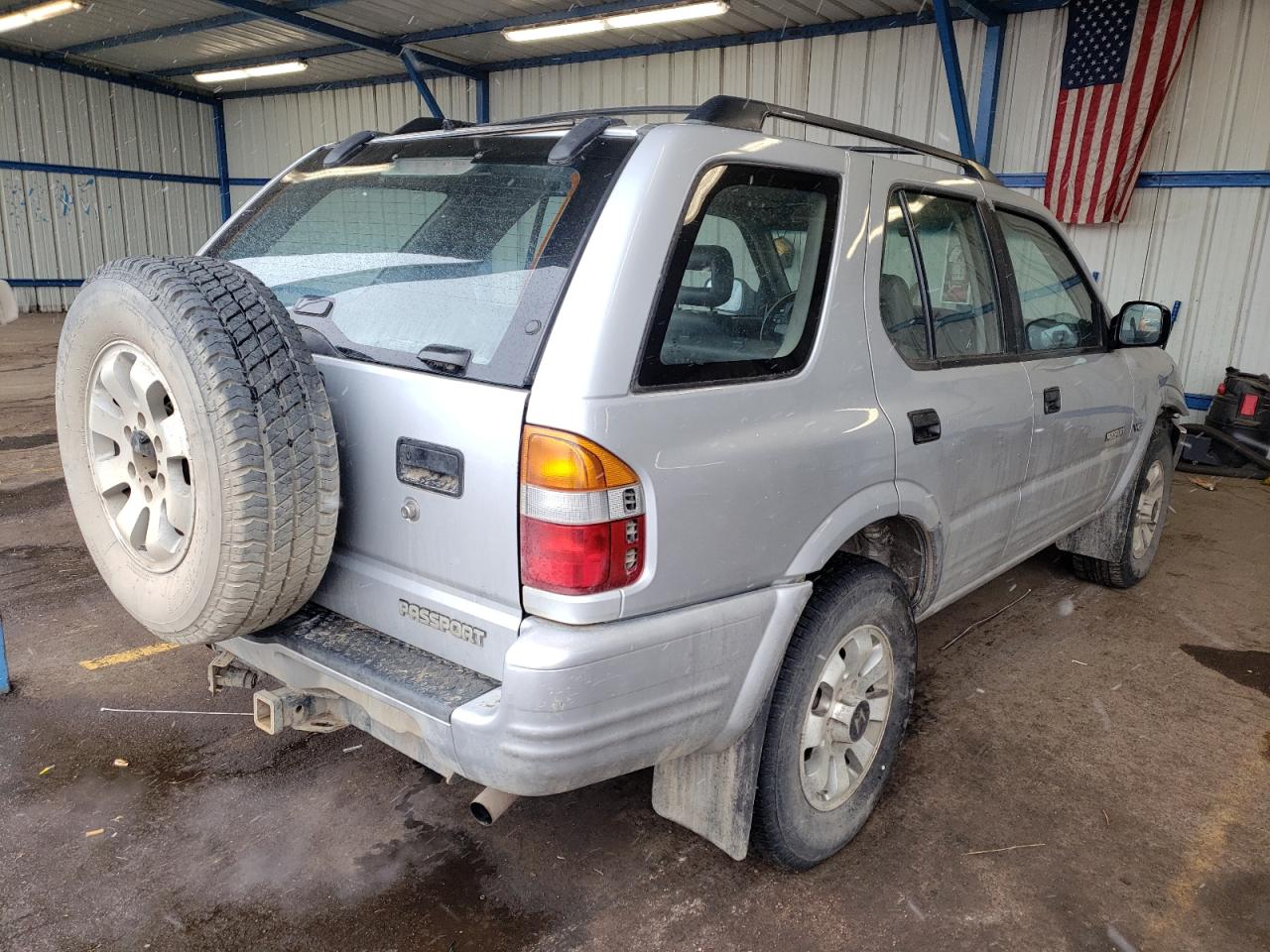 Photo 4 from auction – 1998 HONDA PASSPORT E with VIN 4S6CM58WXW4403768