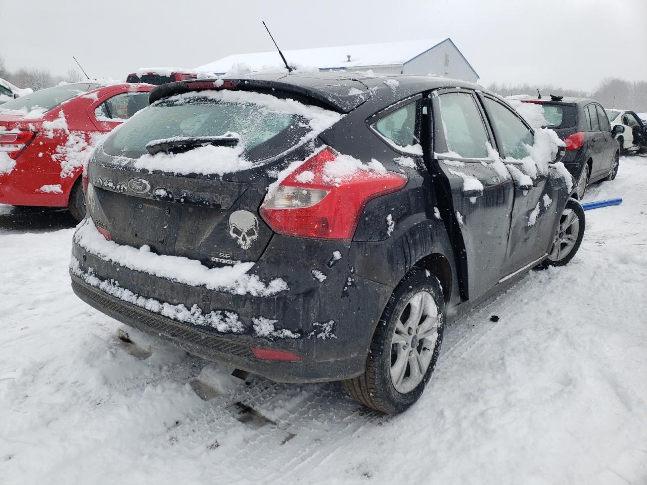 Foto 4 de la subasta – 2014 FORD FOCUS SE con VIN 1FADP3K20EL429356