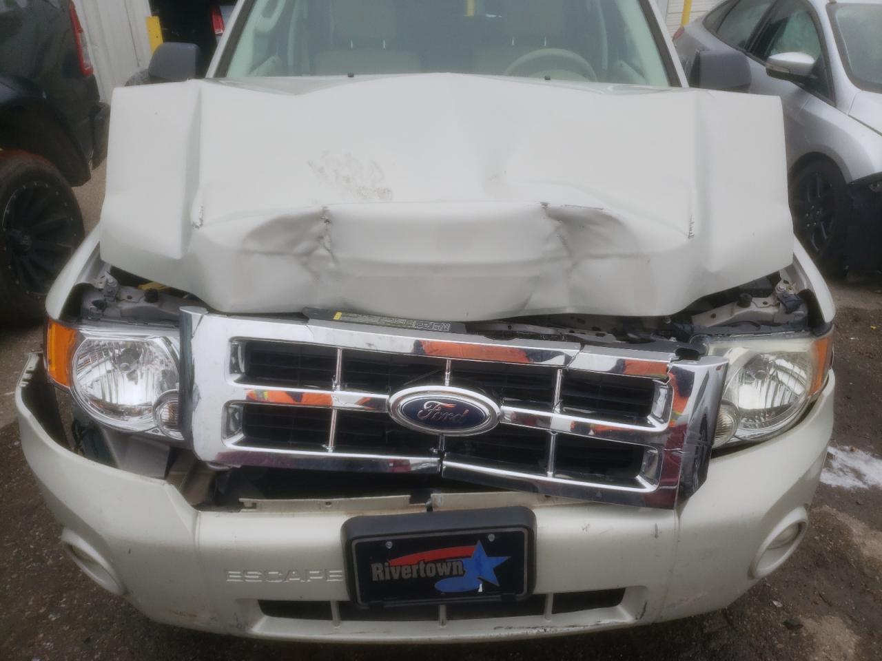 Photo 7 from auction – 2009 FORD ESCAPE XLT with VIN 1FMCU03709KA02421