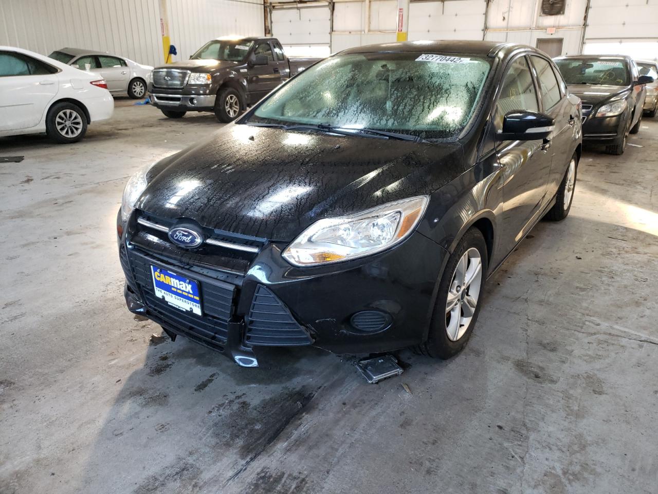 Photo 2 from auction – 2014 FORD FOCUS SE with VIN 1FADP3F27EL181150