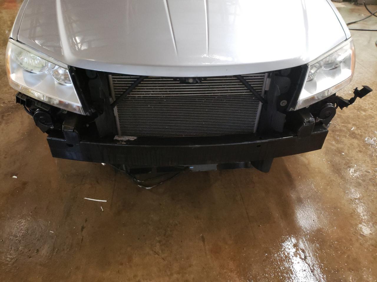 Photo 9 from auction – 2014 DODGE AVENGER SE with VIN 1C3CDZABXEN113555
