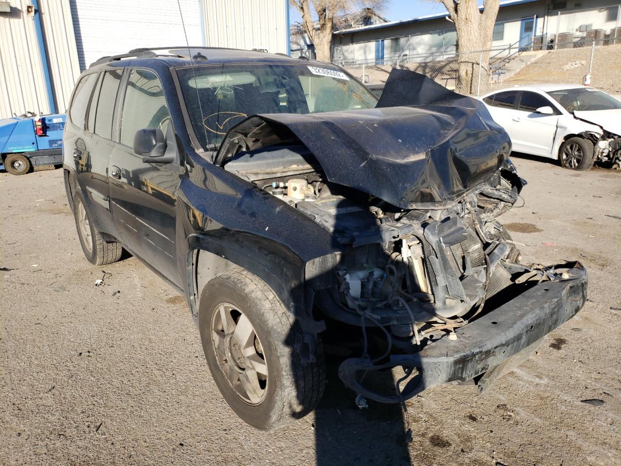 GMC ENVOY 2004 with VIN 1GKDS13S742297765 - Photo from auction