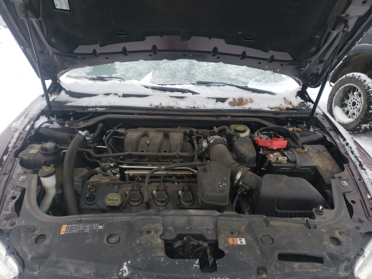 Photo 7 from auction – 2015 FORD TAURUS SEL with VIN 1FAHP2E81FG206779