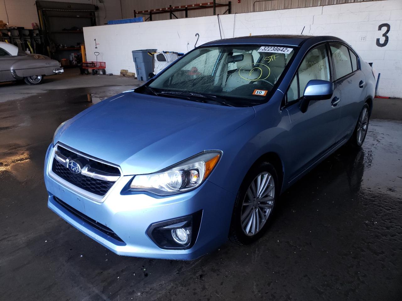 Photo 2 from auction – 2012 SUBARU IMPREZA LI with VIN JF1GJAK67CH018476