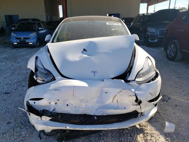 Photo 9 from auction – 2022 TESLA MODEL 3 with VIN 5YJ3E1EB3NF105722