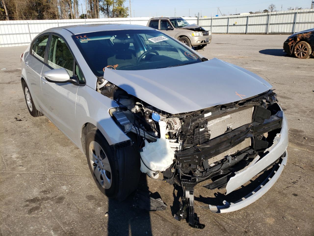 KIA FORTE LX 2017 with VIN 3KPFK4A75HE071303 - Photo from auction