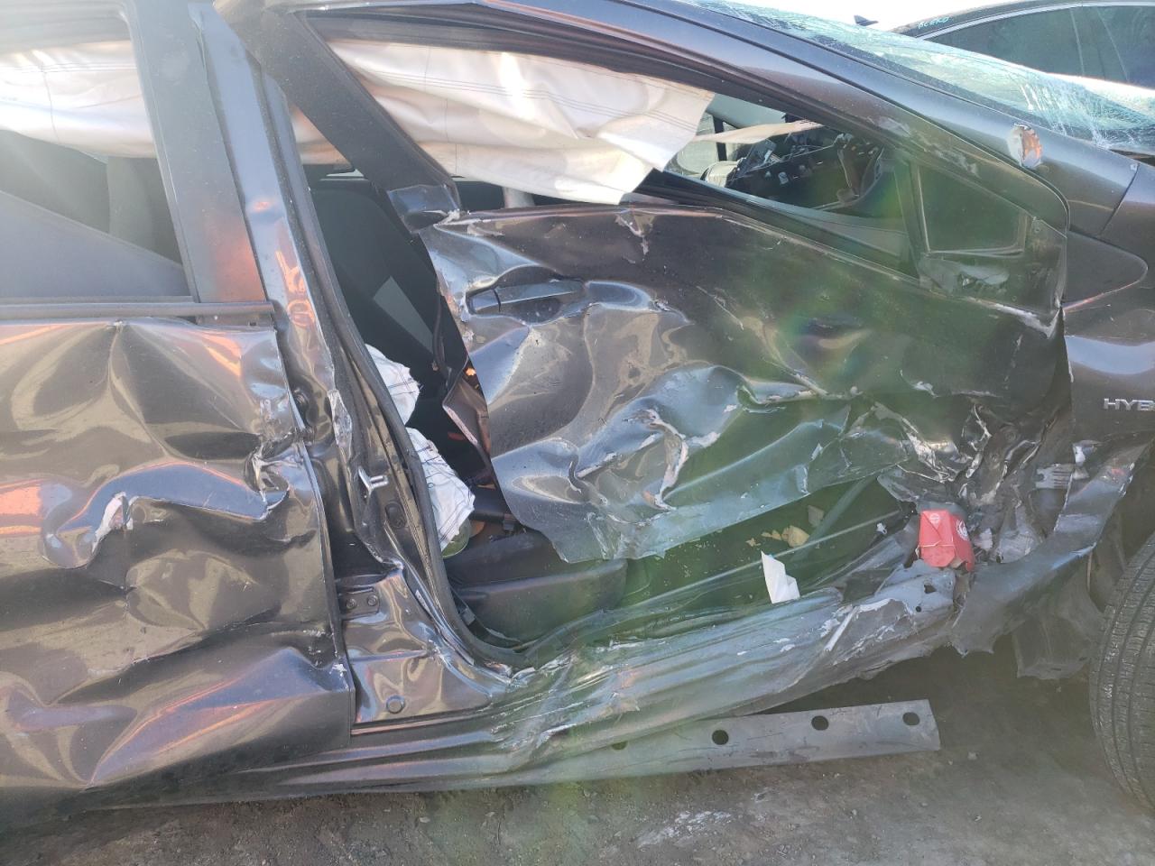 Photo 5 from auction – 2015 TOYOTA PRIUS C with VIN JTDKDTB37F1576998