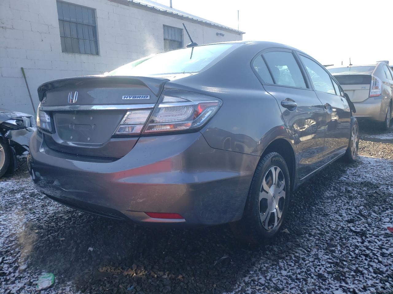 Photo 4 from auction – 2014 HONDA CIVIC HYBR with VIN 19XFB4F26EE201890