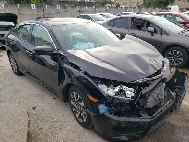 Photo 1 from auction – 2018 HONDA CIVIC EX with VIN 19XFC2F79JE026316