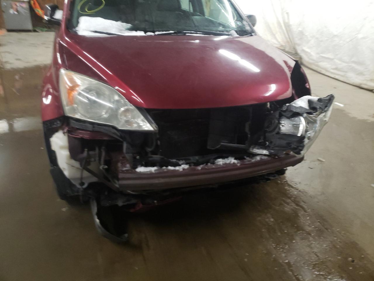Photo 9 from auction – 2011 HONDA CR-V LX with VIN 5J6RE4H33BL059389