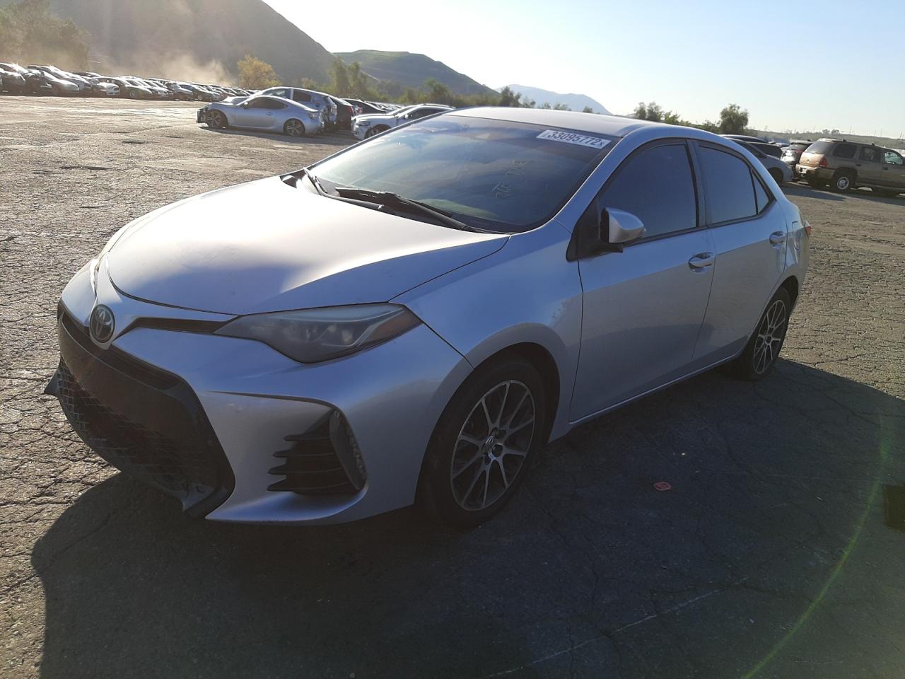 Photo 2 from auction – 2017 TOYOTA COROLLA L with VIN 5YFBURHE4HP606548