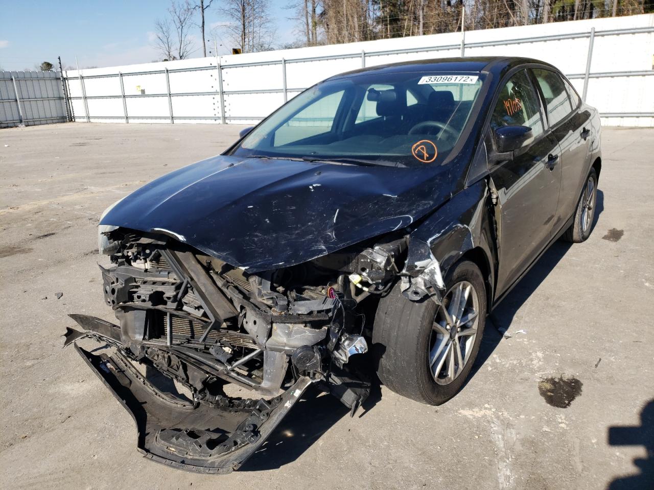 Photo 2 from auction – 2015 FORD FOCUS SE with VIN 1FADP3F24FL233870