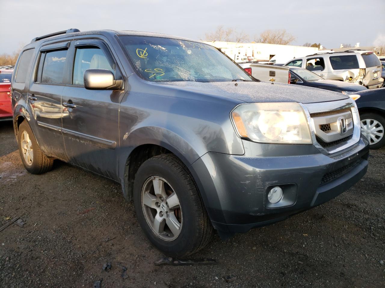 HONDA PILOT 2011 with VIN 5FNYF4H52BB035765 - Photo from auction