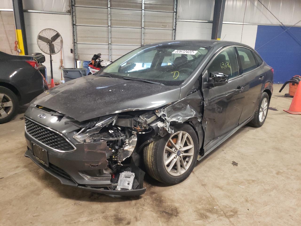 Photo 2 from auction – 2016 FORD FOCUS SE with VIN 1FADP3F23GL308009