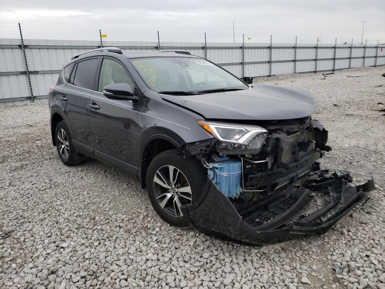 TOYOTA RAV4 XLE 2017 with VIN JTMWFREV3HD102995 - Photo from auction
