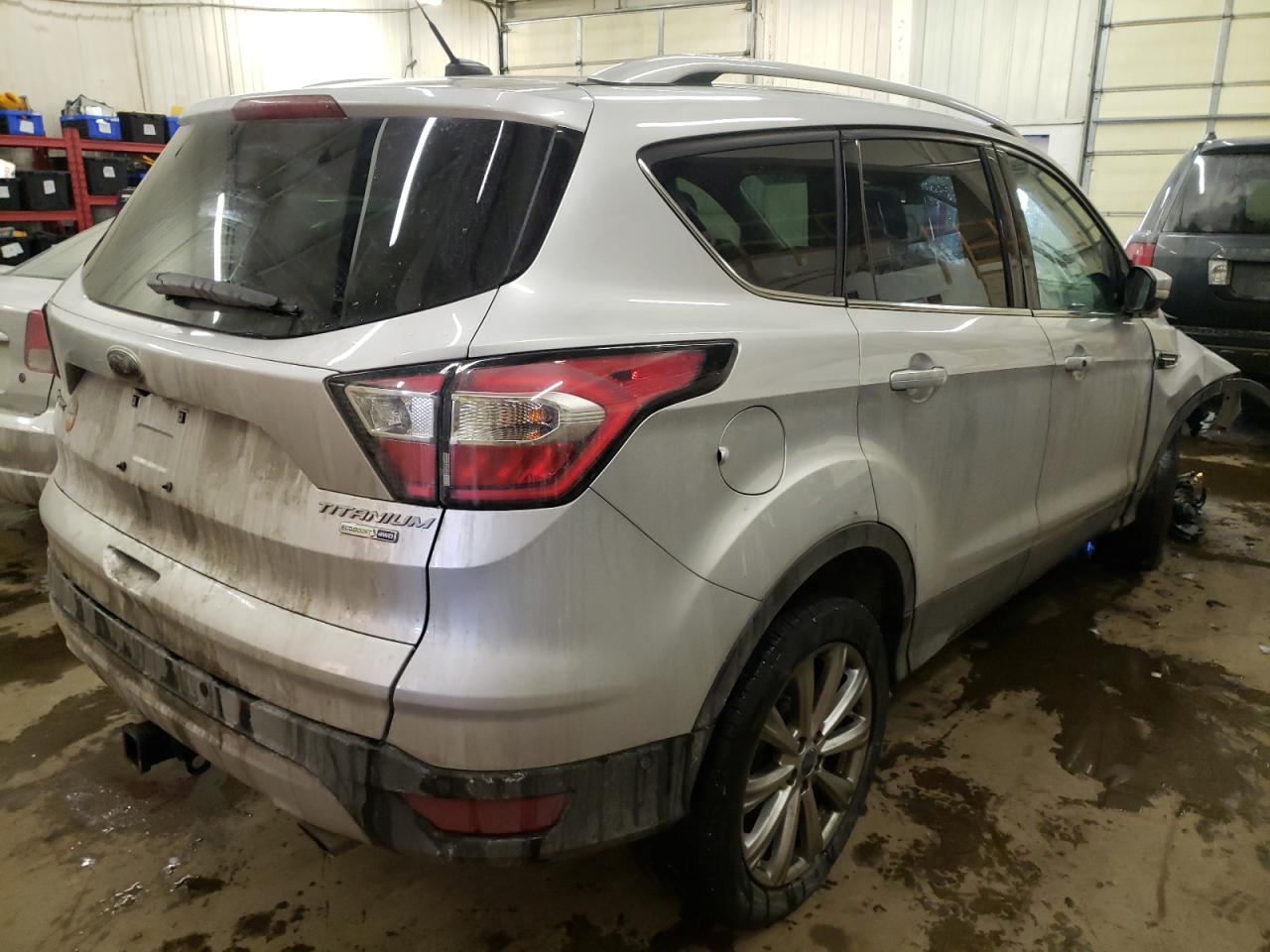 Photo 4 from auction – 2017 FORD ESCAPE TIT with VIN 1FMCU9J90HUE78650