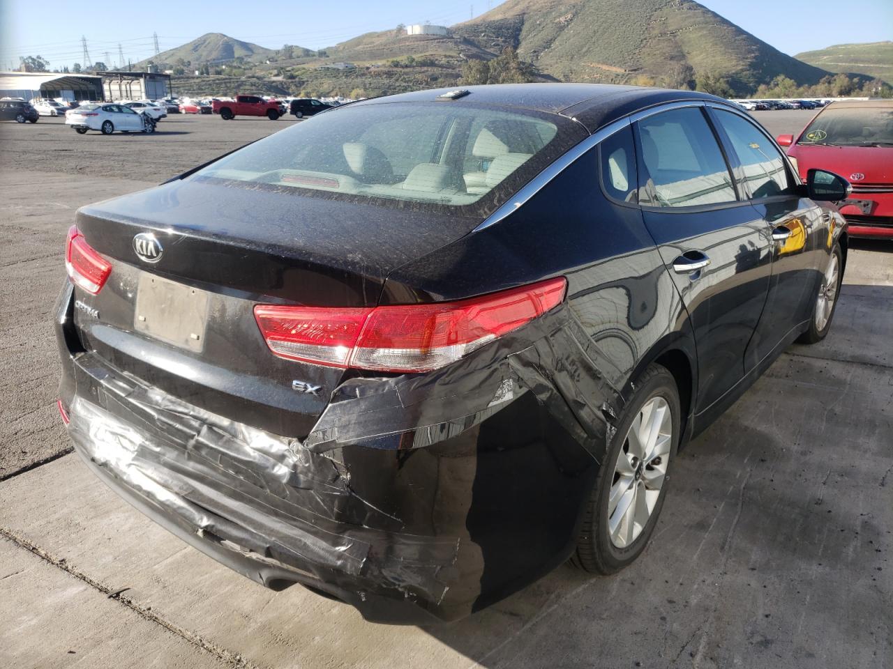 Photo 4 from auction – 2016 KIA OPTIMA EX with VIN 5XXGU4L3XGG055578